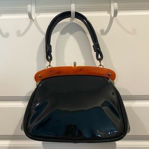 Vintage 1930s patent kelly bag